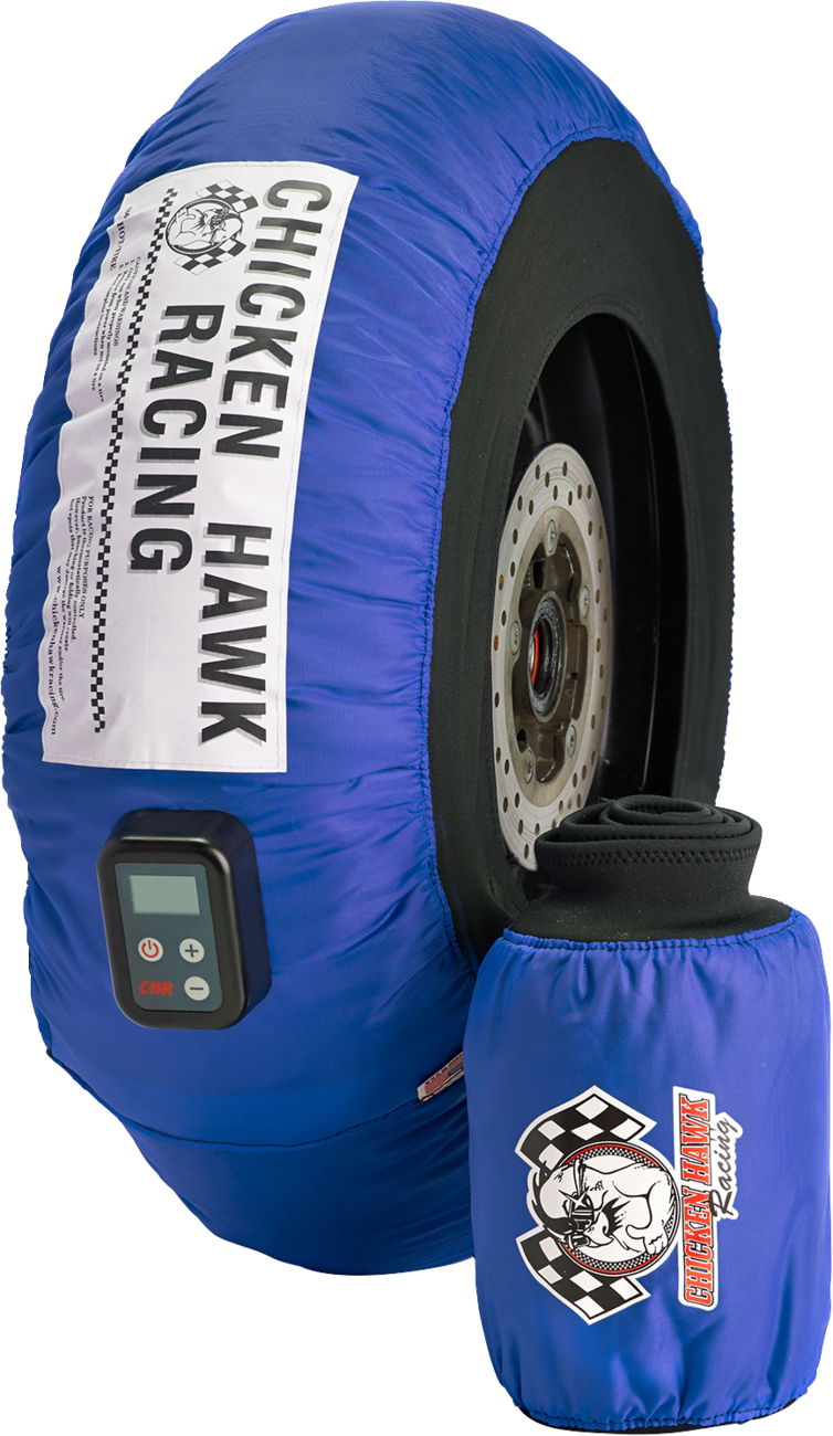 Motorcycle tire warmers beside a lightweight beginner track bike setup